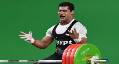 اتحاد رفع الأثقال يعلق على سحب الميدالية البرونزية من محمد إيهاب